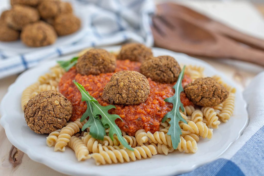 bowl of whole grain spaghetti with tofu neat balls. 