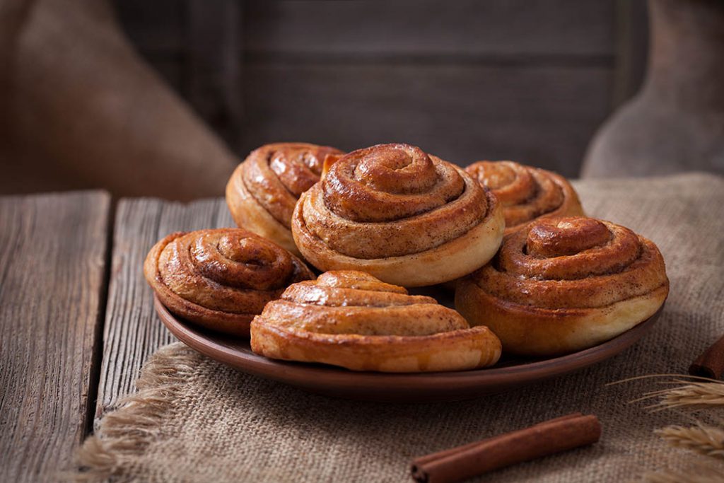 Sweet homemade cinnamon bun rolls made form whole wheat flour.