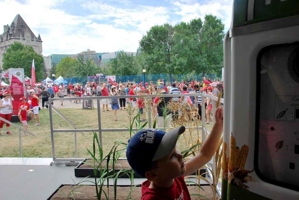 Learning about ethanol on the Growing Connections trailer on Canada Day