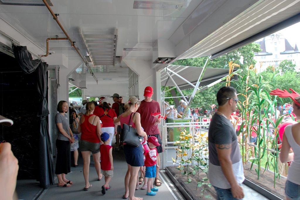 Visitors in the Growing Connections trailer on Canada Day