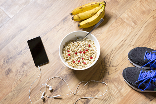 Oatmeal with berries and banana after a workout .