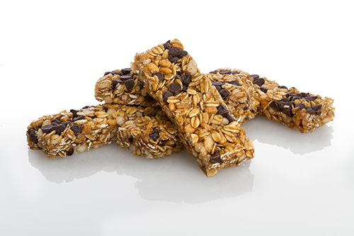 some chocolate chip granola bars on a white background