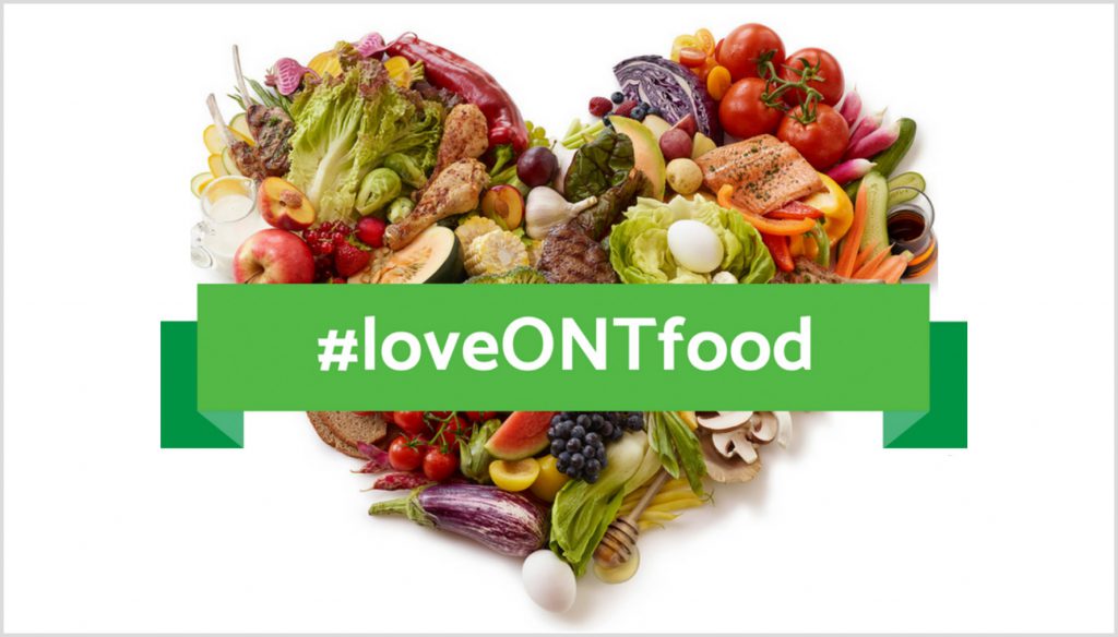 a heart made out of different fresh foods with the hashtag #loveONTfood in a banner overtop