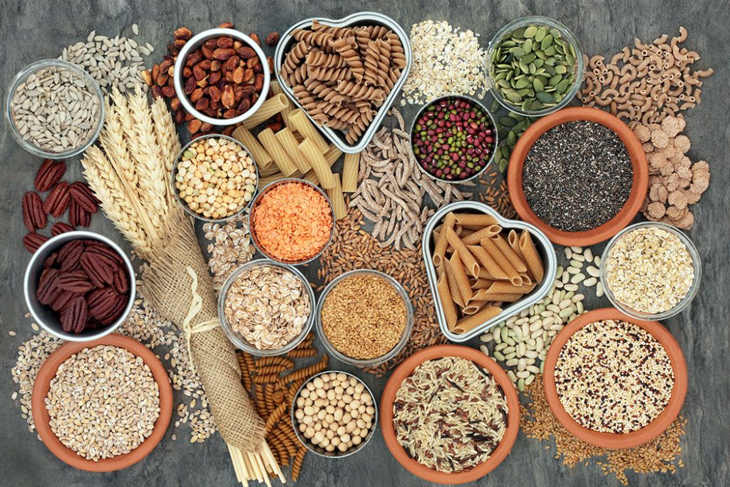 Healthy High Fibre Foodchoice laid out on a wood table in bowls.